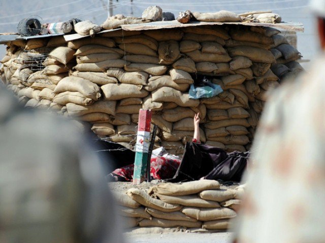 ET: Woman attacker (C) raises her hand next to a security checkpoint during exchange of fire with Pakistani troops in Quetta. PHOTO: AFP May 20, 2011 http://tribune.com.pk/story/172557/chechen-terrorist-was-pregnant-when-shot-dead/ Quetta